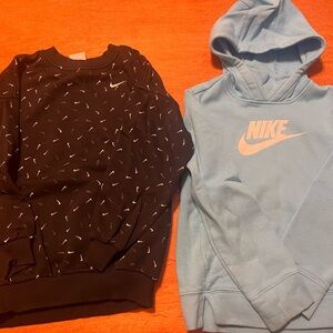 2 Nike sweatshirts - Black Patterned and Light Blue Hooded Sweatshirts - Small